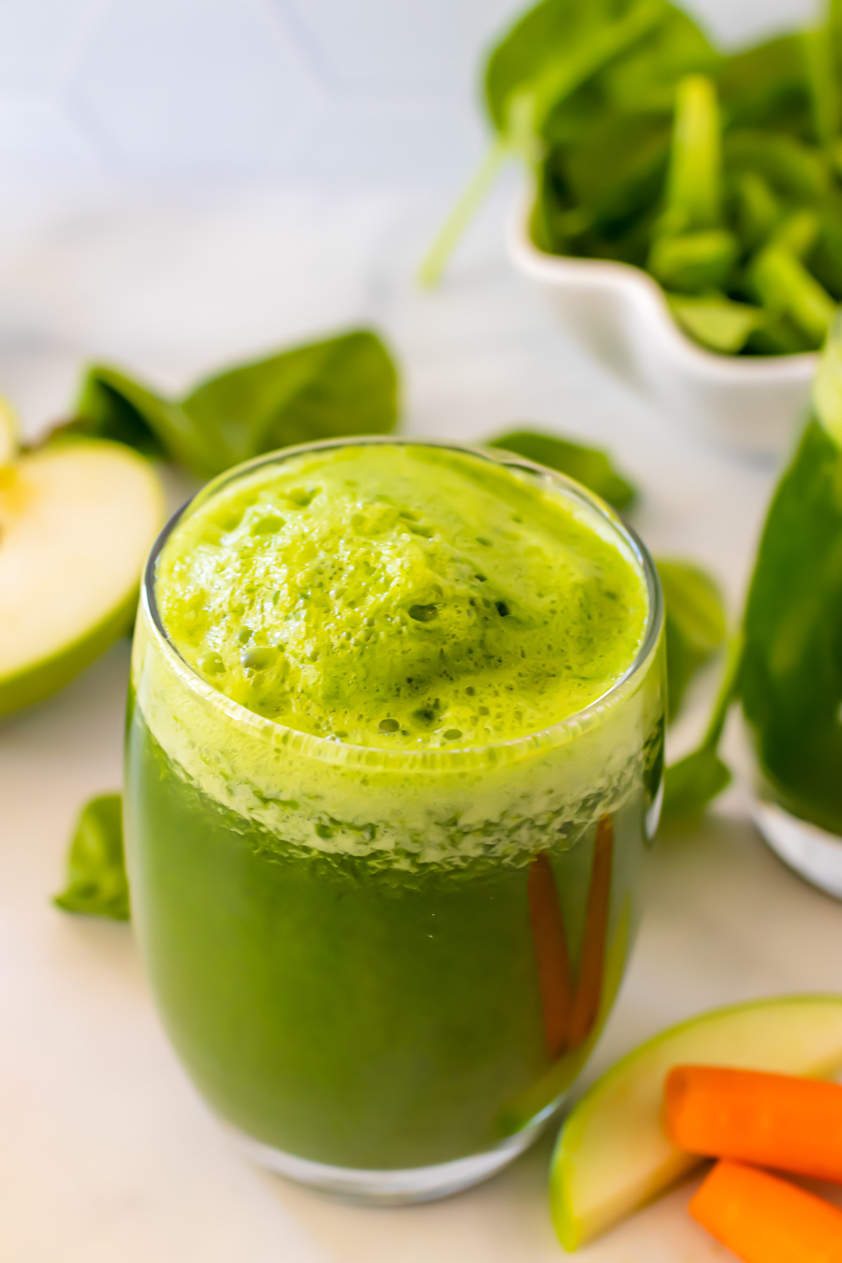 A glass of green juice.