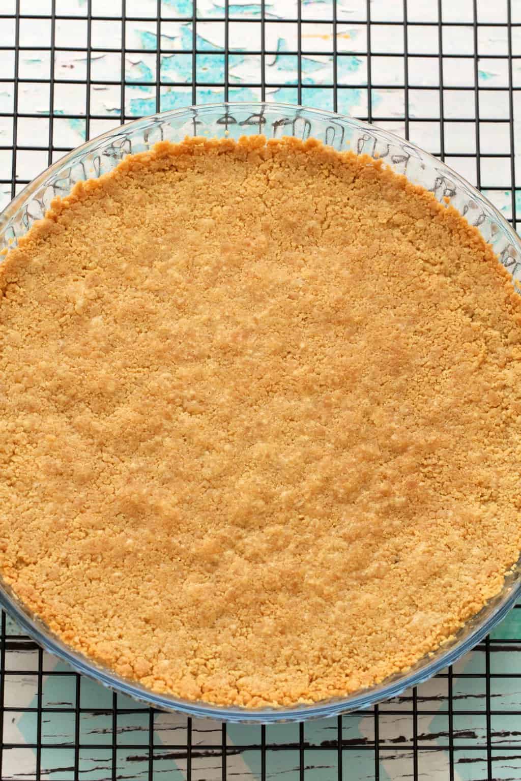 Baked Golden Oreo crust in a glass pie dish. 