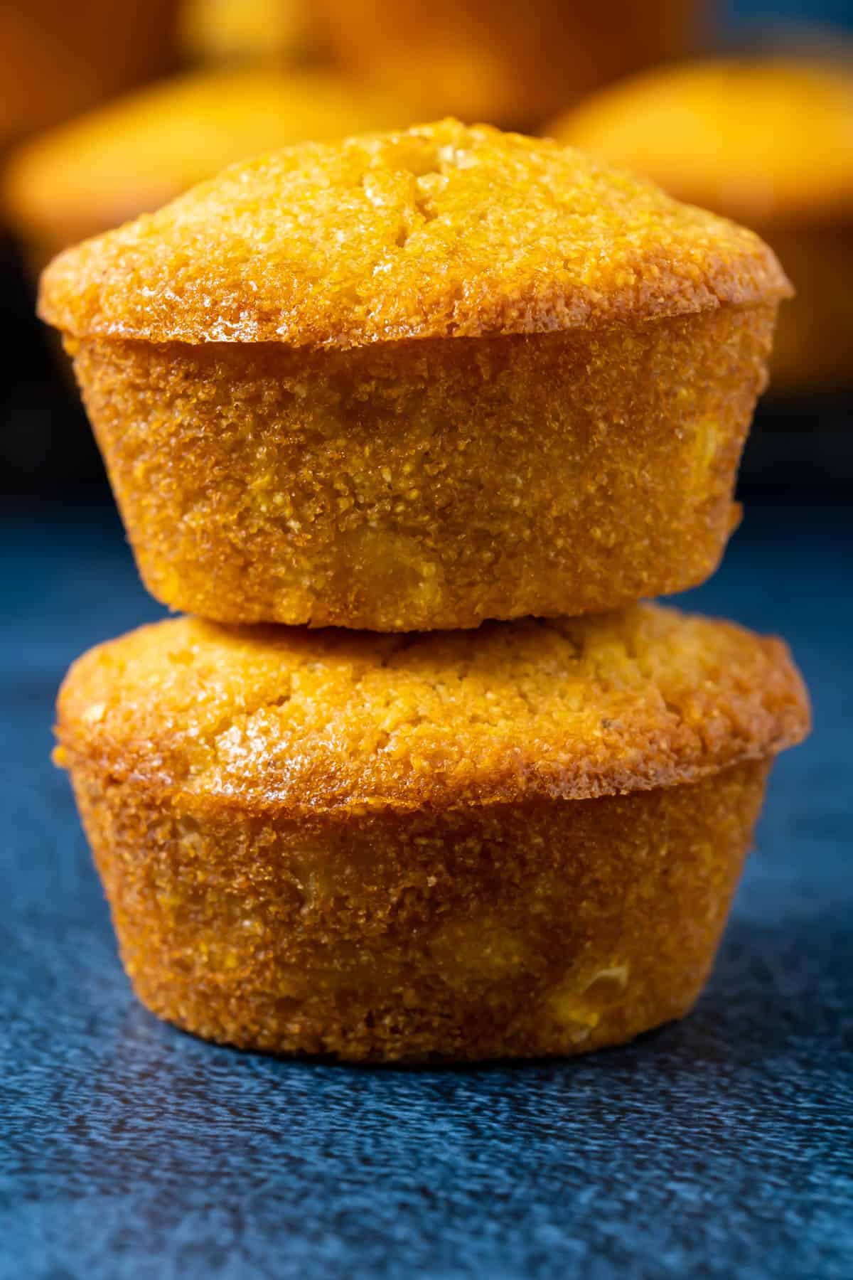 Stack of two vegan cornbread muffins