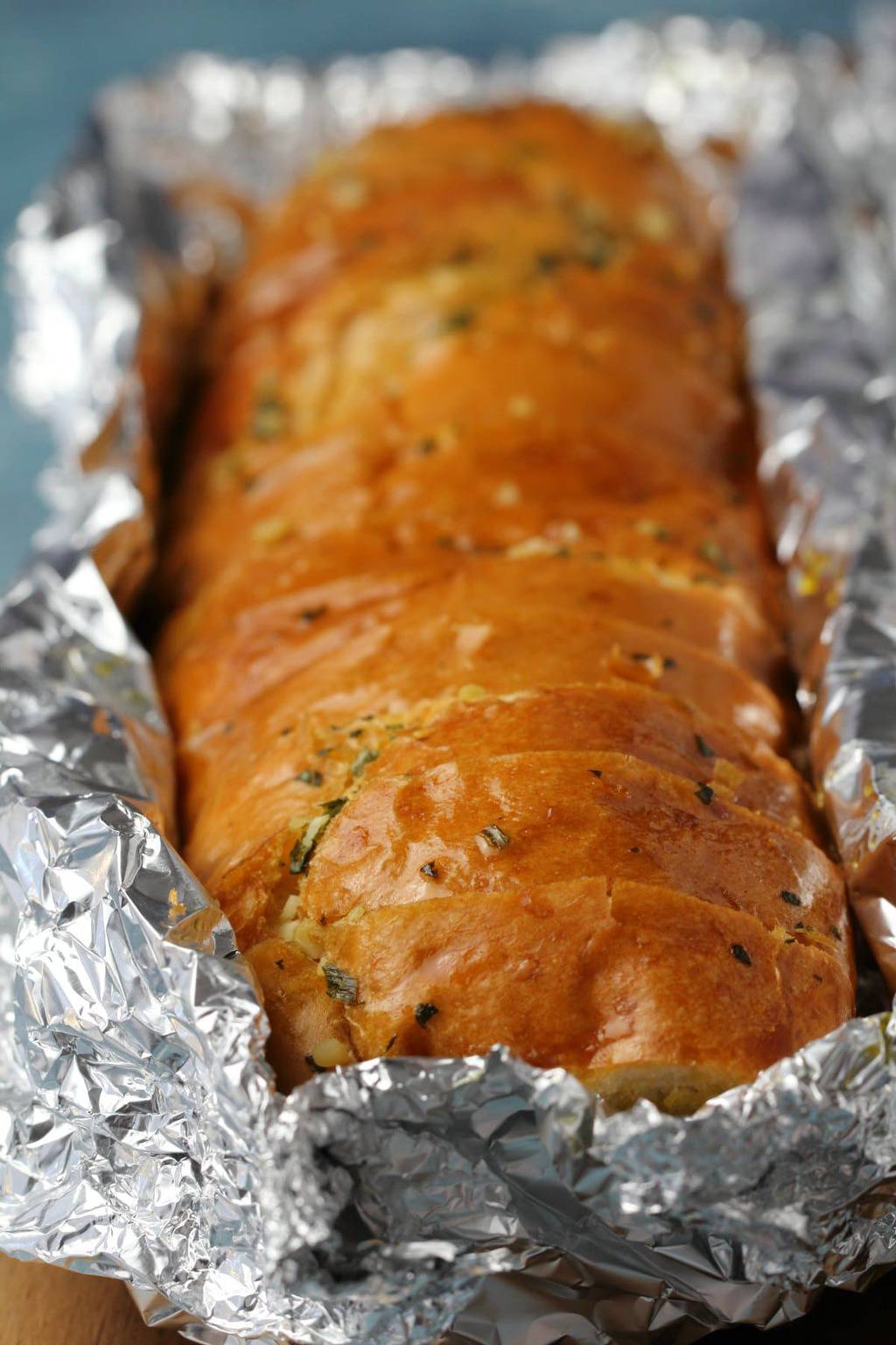Vegan garlic bread in foil.