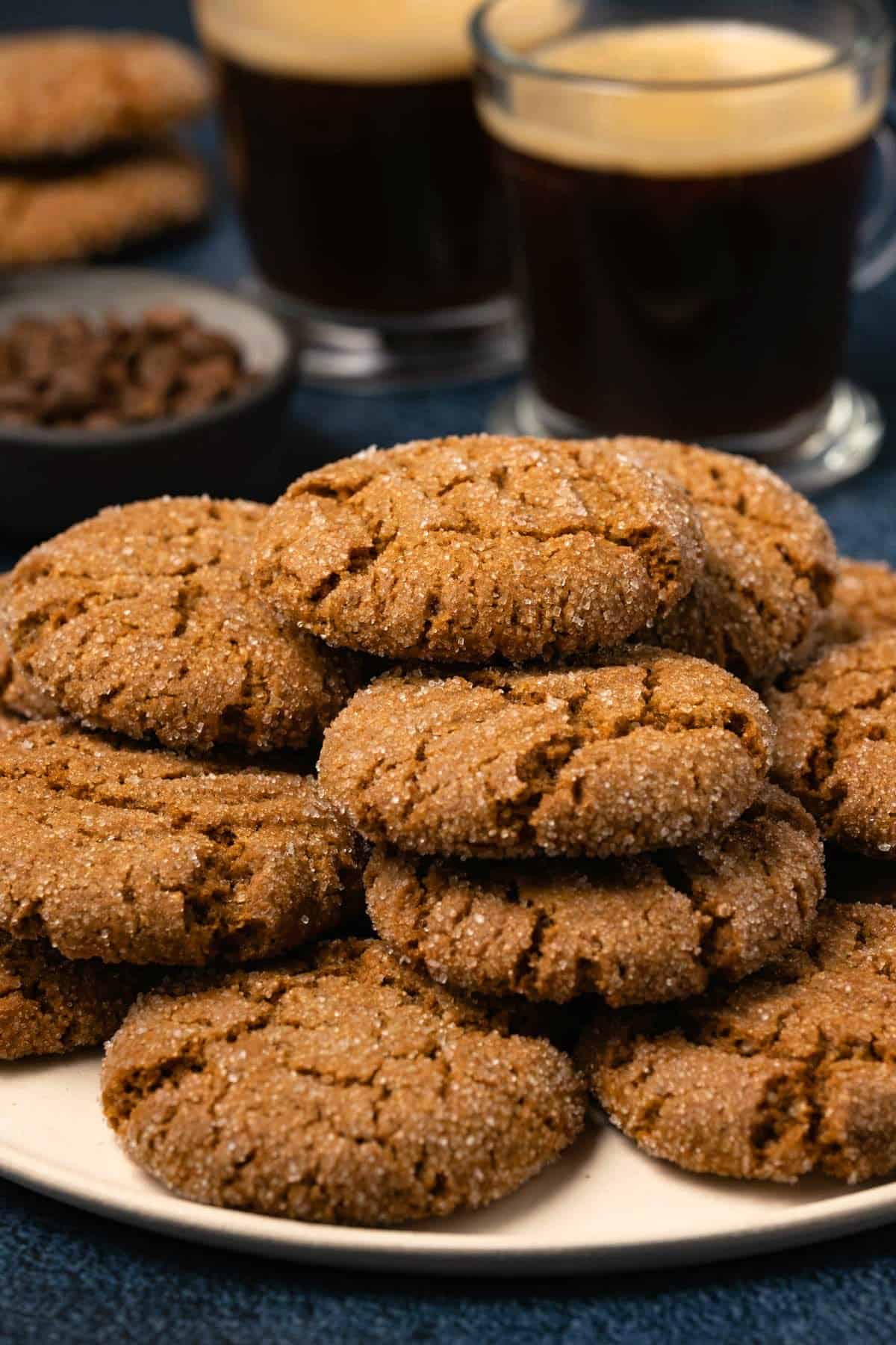 Stack of vegan ginger cookies on a plate. 