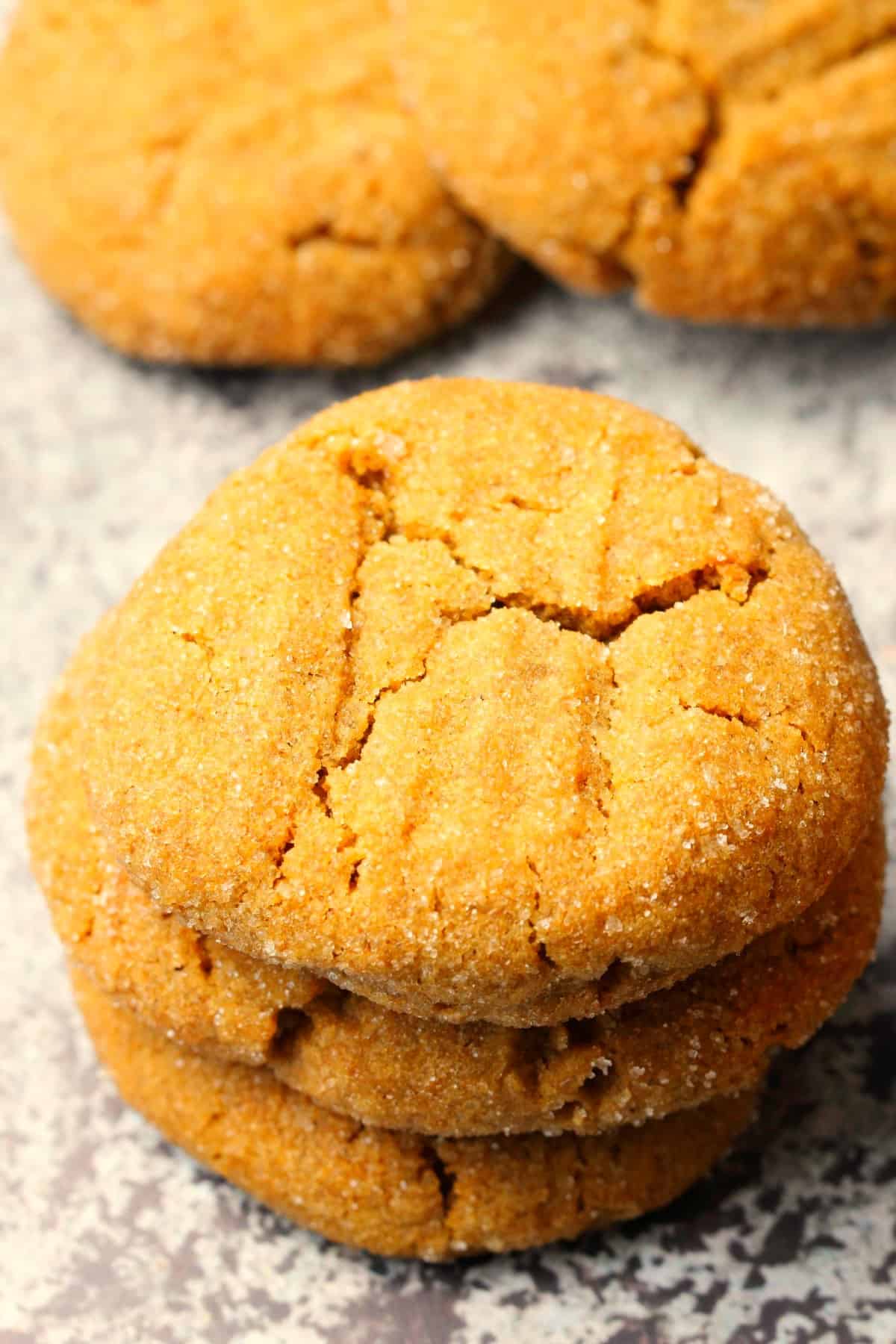 A stack of three molasses cookies. 