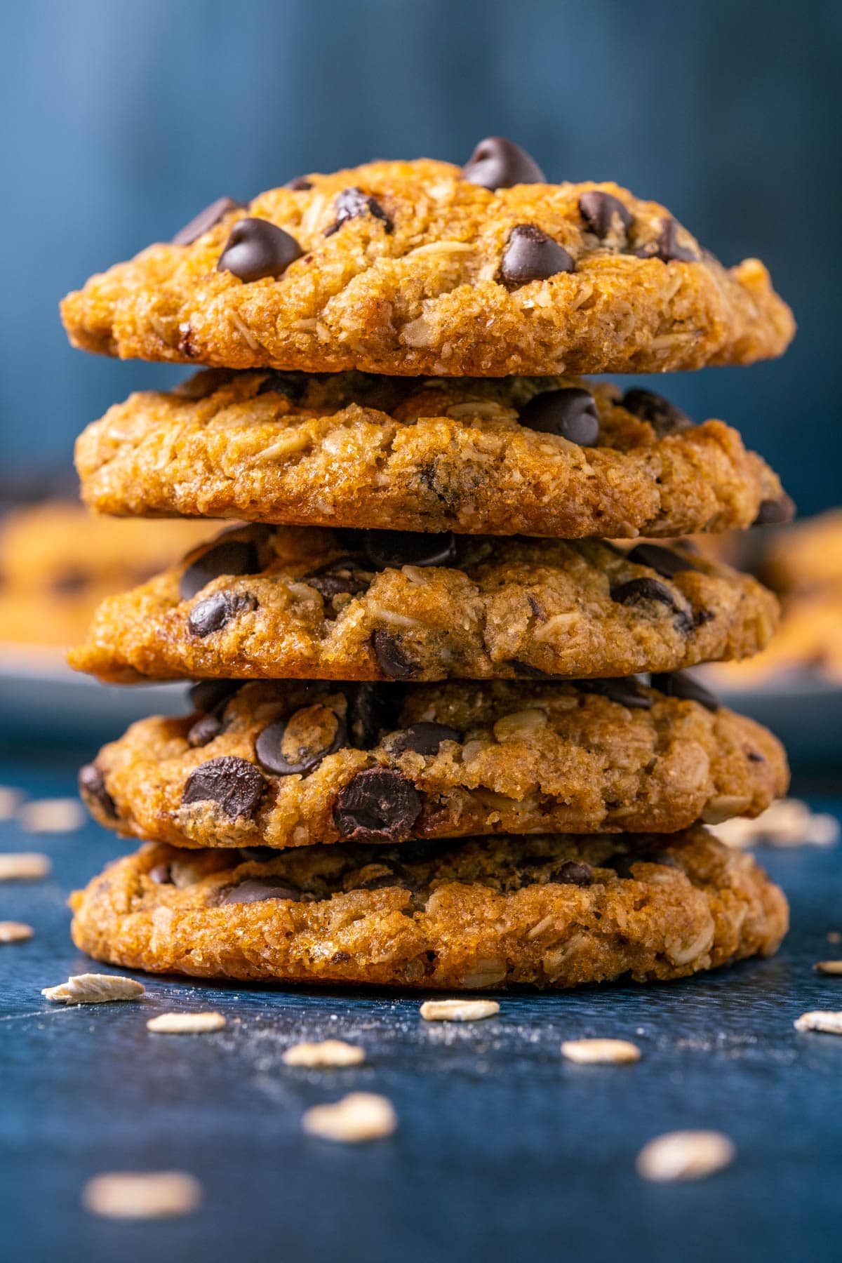 Five oatmeal chocolate chip cookies in a stack.