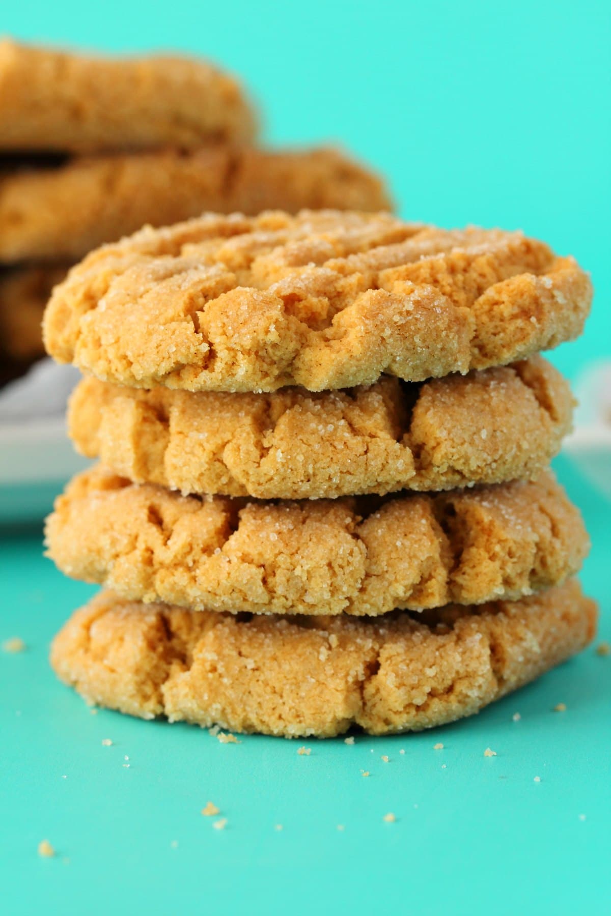 A stack of four peanut butter cookies. 