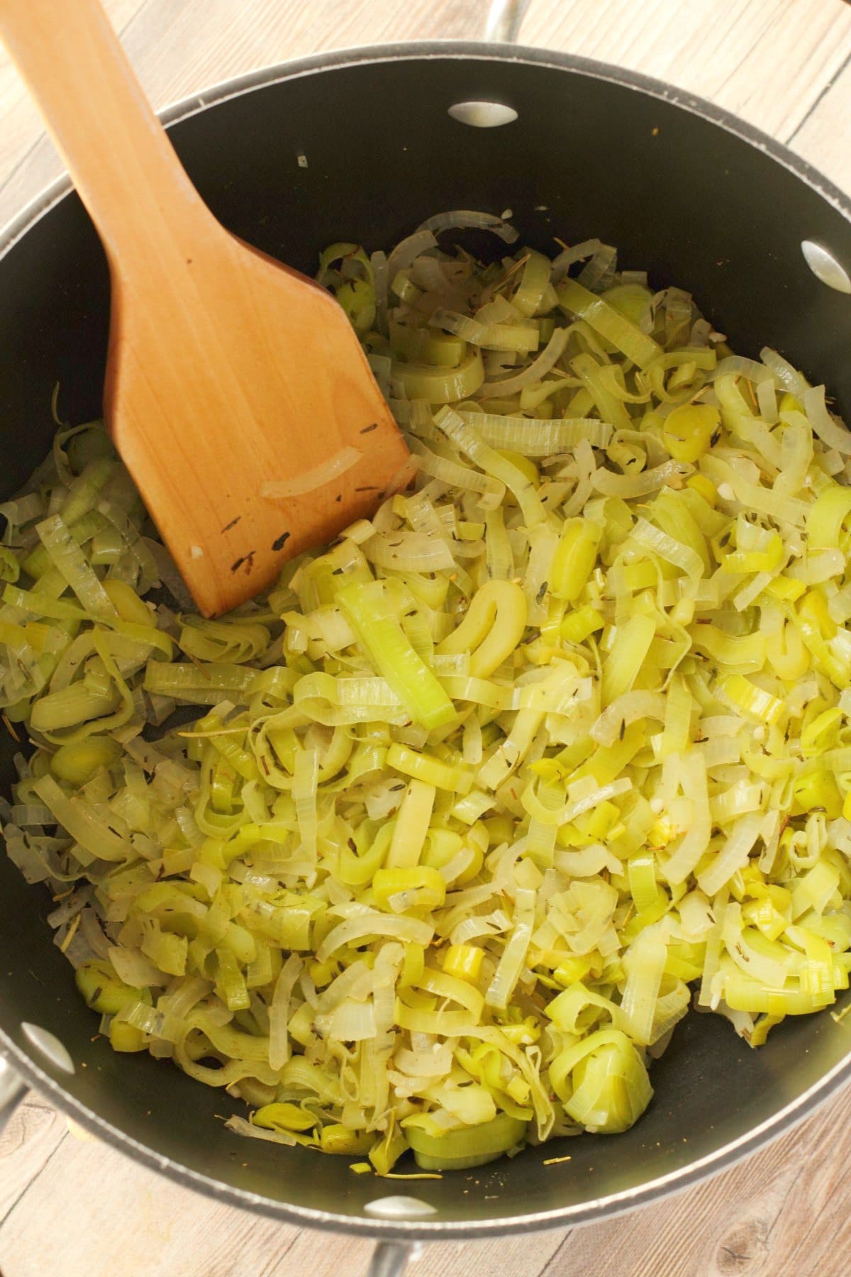 Chopped onions, chopped leeks, crushed garlic and olive oil sautéed in a pot.